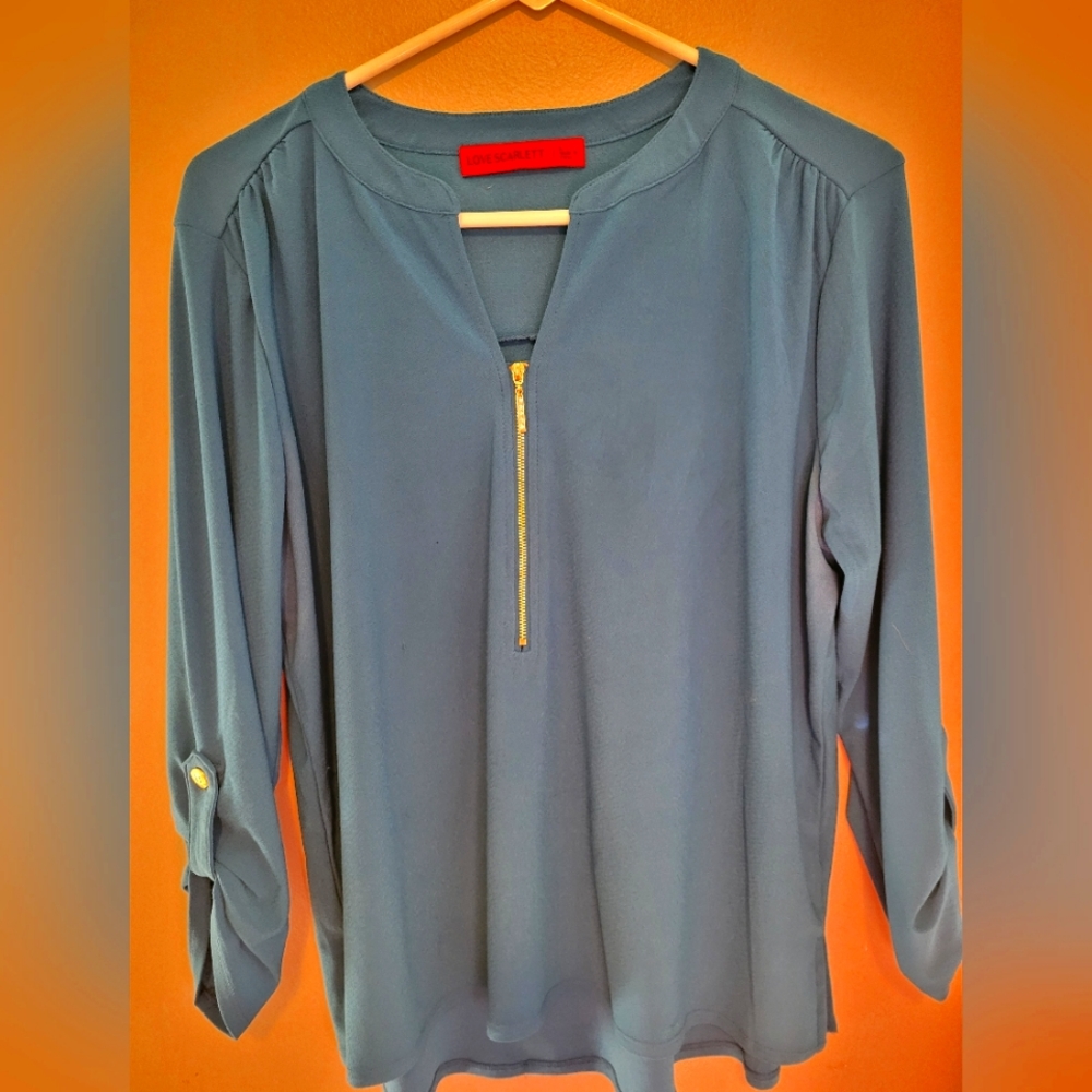 Large teal blouse quarter sleeve with gold colored buttons and front zipper